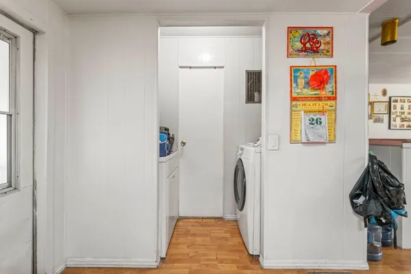 a view of game room with wooden floor
