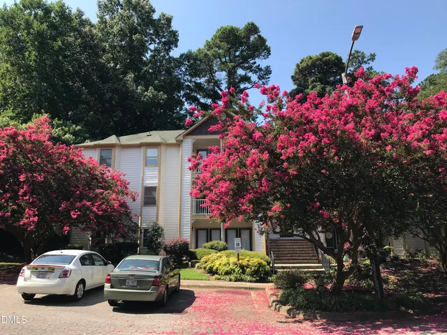 a car parked in front of a house