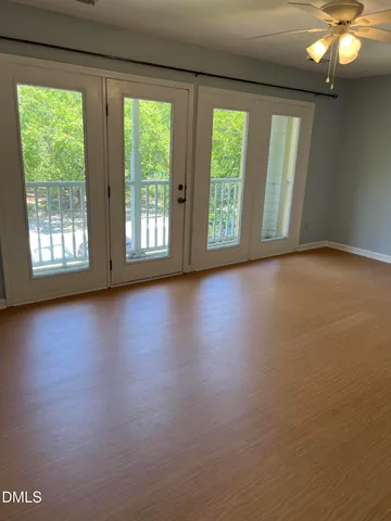 a kitchen with stainless steel appliances granite countertop a refrigerator a sink and a stove