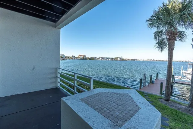 a view of a chairs and table in the garden