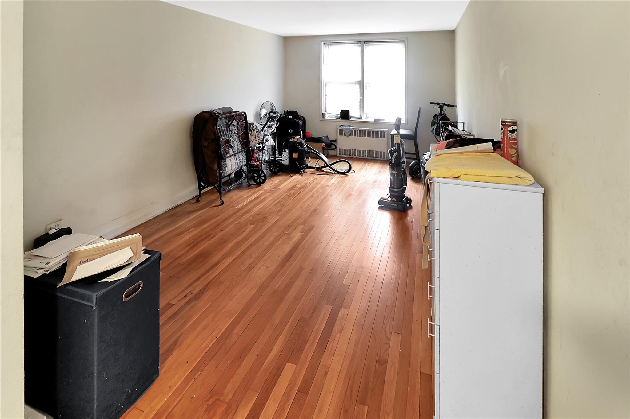 2105 Wallace Avenue, Unit 4A Bronx, NY 10462 - Photo 13 of 29 a view of a room with chairs and wooden floor