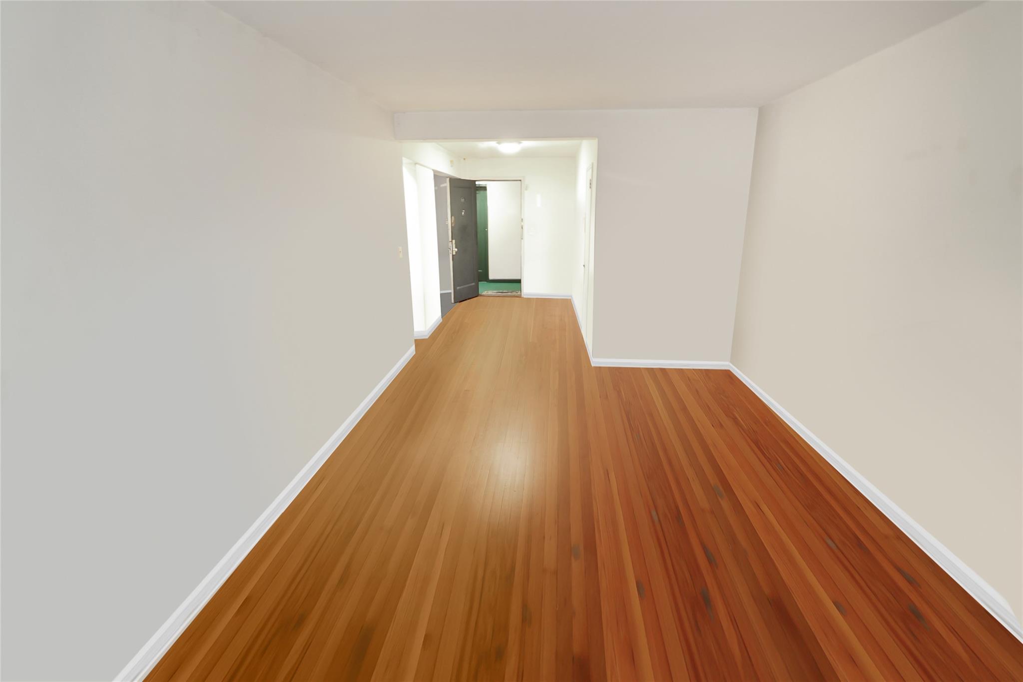 2105 Wallace Avenue, Unit 4A Bronx, NY 10462 - Photo 15 of 29 a view of a room with wooden floor