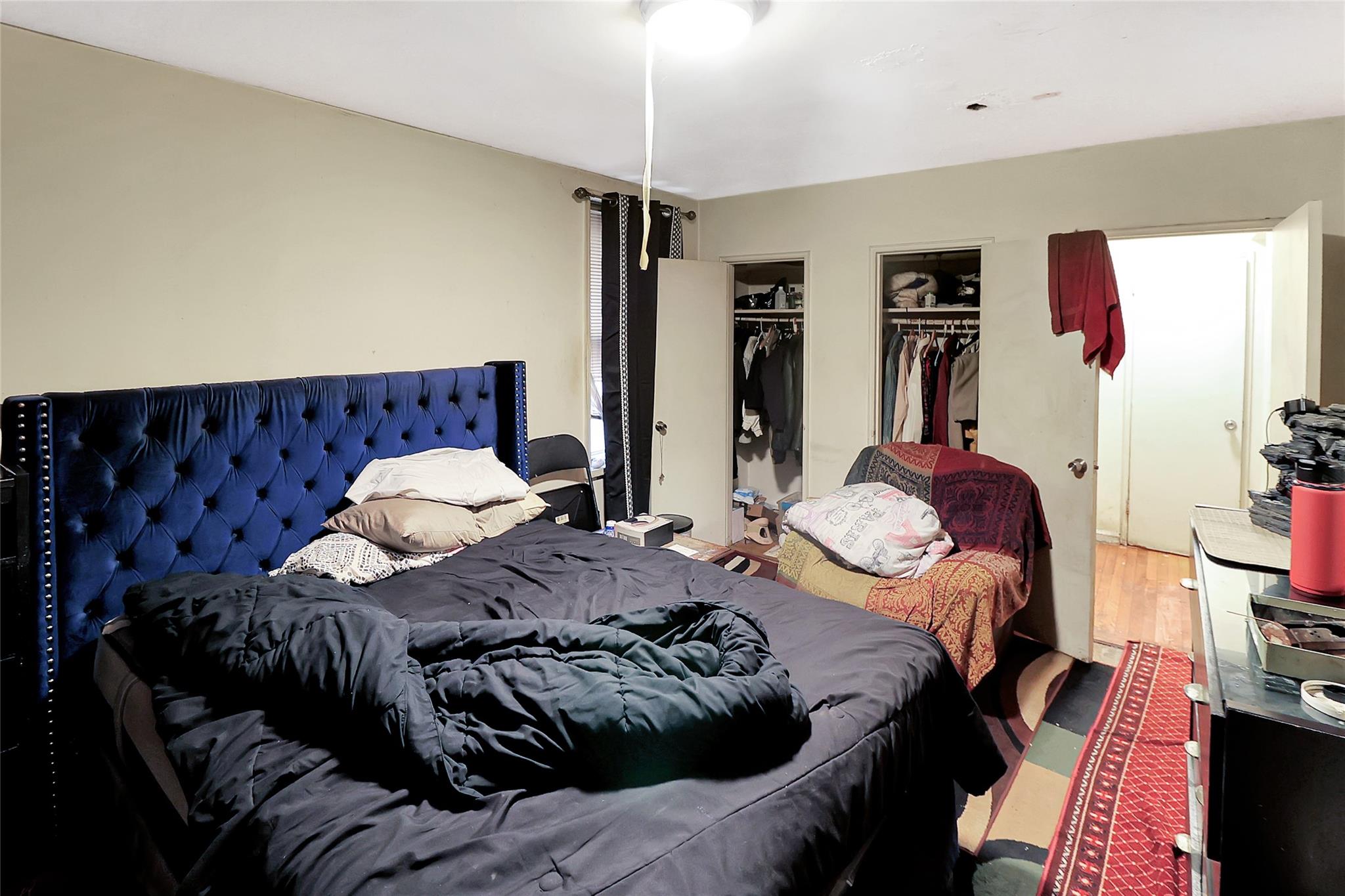 2105 Wallace Avenue, Unit 4A Bronx, NY 10462 - Photo 20 of 29 a bedroom with furniture and a bed