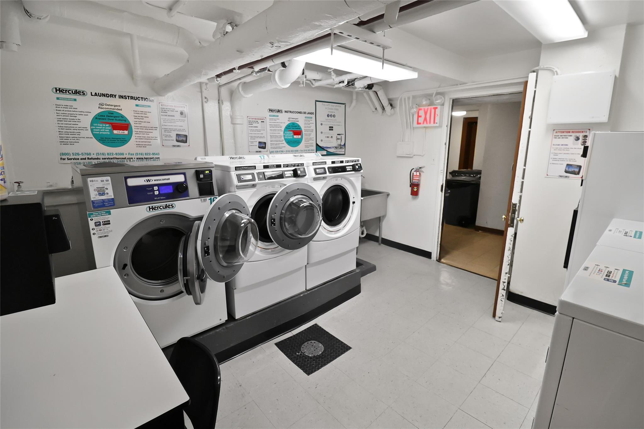 2105 Wallace Avenue, Unit 4A Bronx, NY 10462 - Photo 25 of 29 a utility room with refrigerator and washer