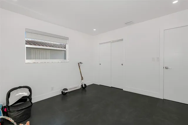 a room with a sink and a window