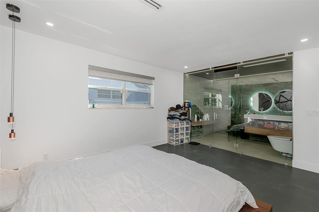 5300 Garfield Street Hollywood, FL 33021 - Photo 12 of 27 a bedroom with furniture and a window