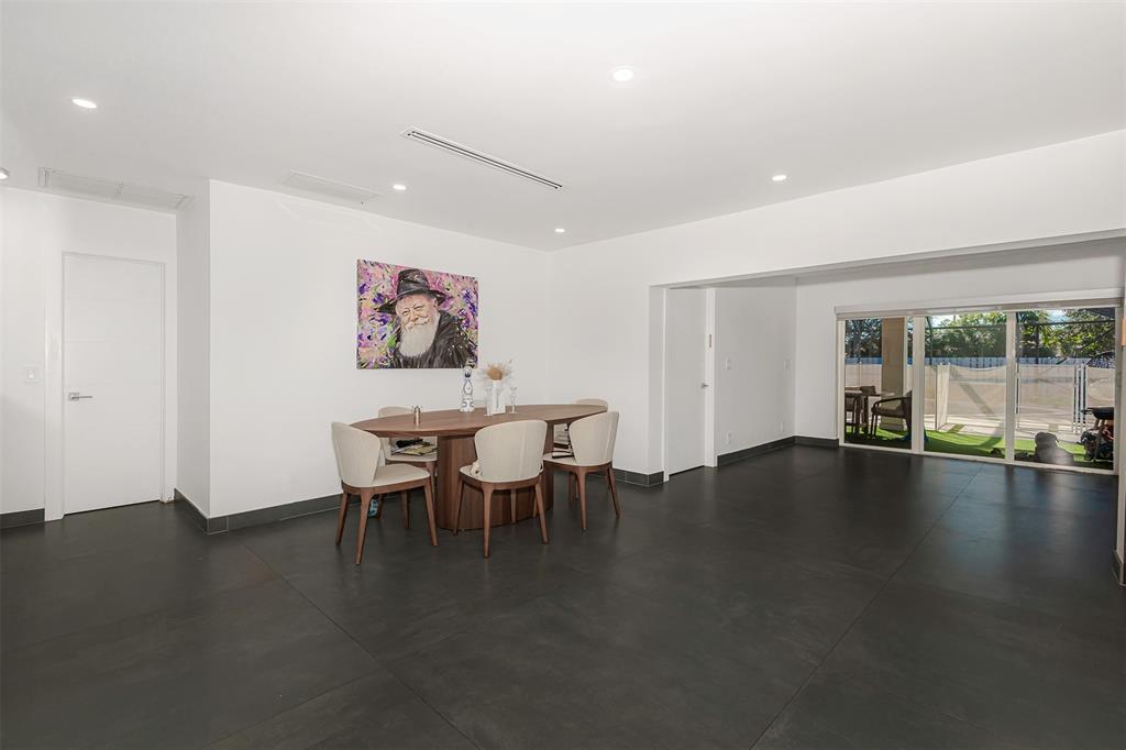 5300 Garfield Street Hollywood, FL 33021 - Photo 15 of 27 a view of a work space with furniture and wooden floor