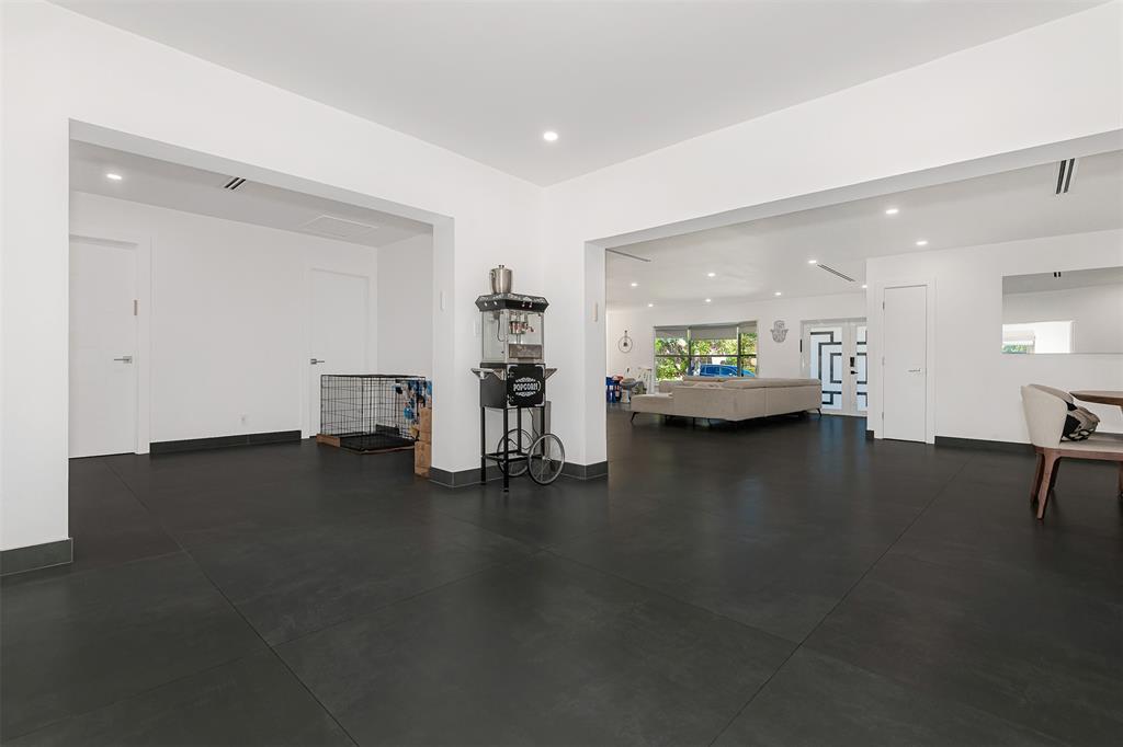 5300 Garfield Street Hollywood, FL 33021 - Photo 17 of 27 a living room with furniture and a flat screen tv