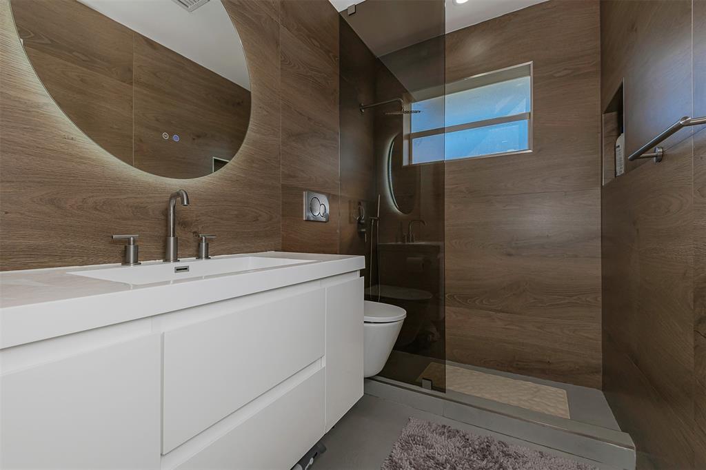 5300 Garfield Street Hollywood, FL 33021 - Photo 8 of 27 a bathroom with a sink and a mirror