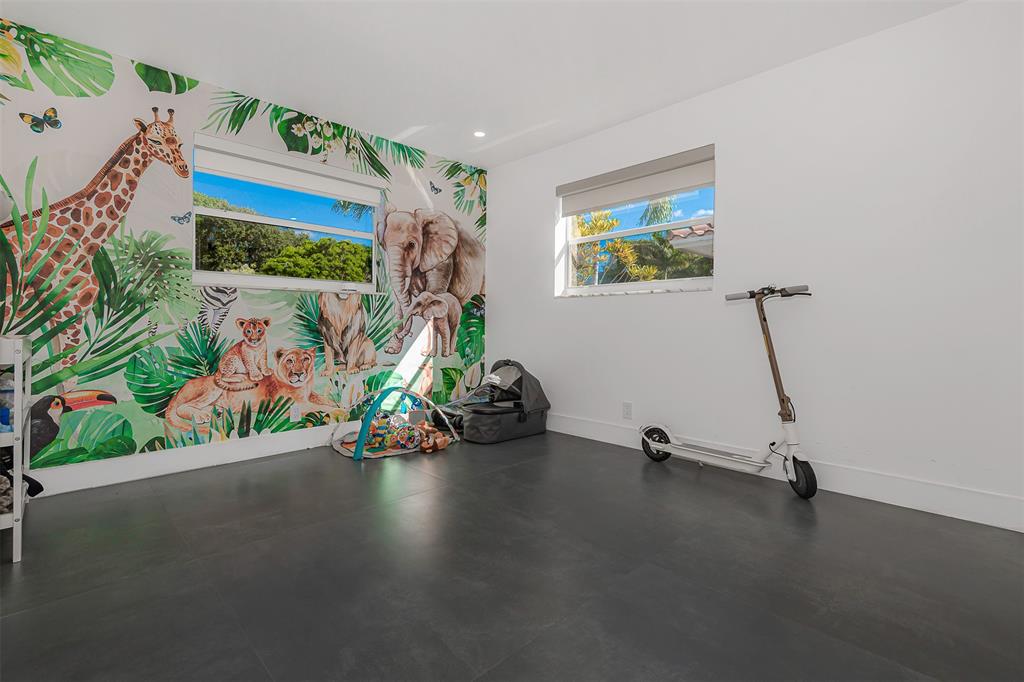 5300 Garfield Street Hollywood, FL 33021 - Photo 9 of 27 a view of a room with gym equipment