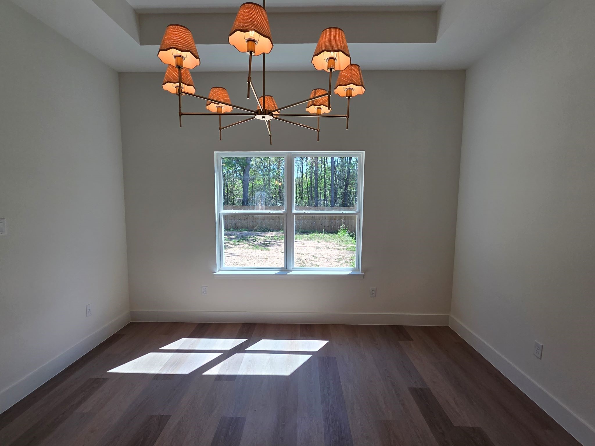 16280 Jeet Street Conroe, TX 77306 - Photo 13 of 31 an empty room with a window