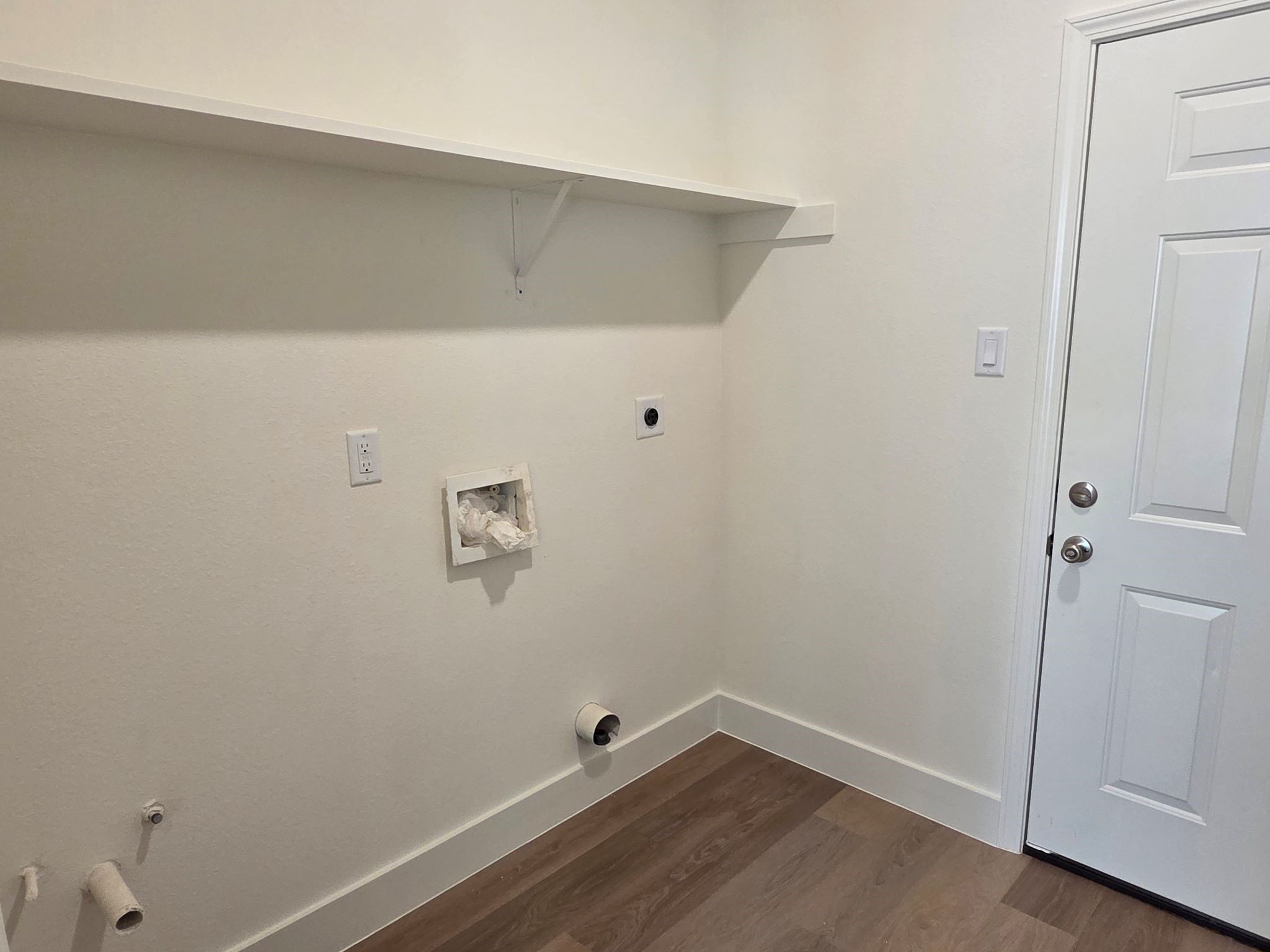 16280 Jeet Street Conroe, TX 77306 - Photo 15 of 31 a view of small space with racks on the wall