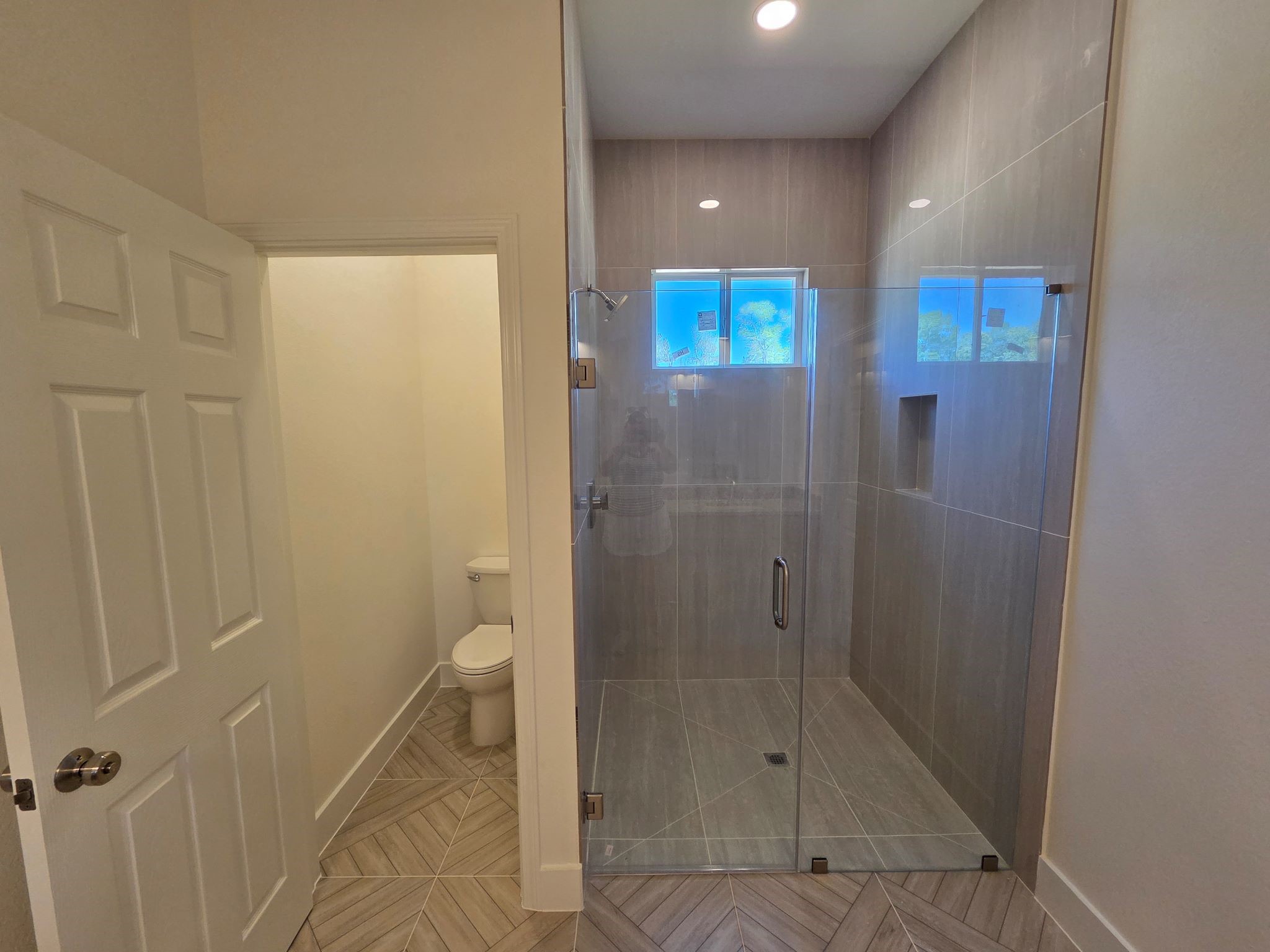 16280 Jeet Street Conroe, TX 77306 - Photo 20 of 31 a bathroom with a shower and a toilet