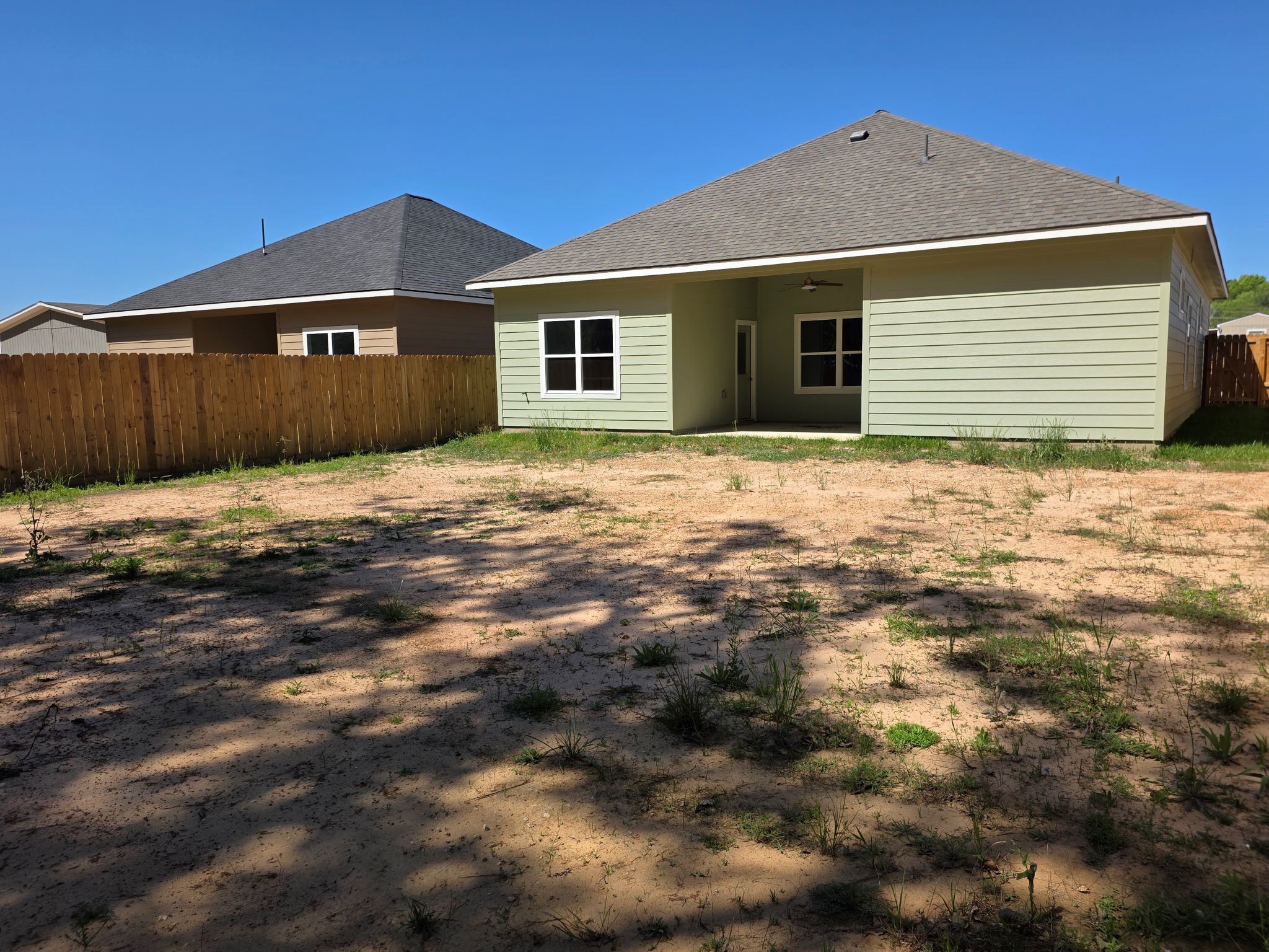 16280 Jeet Street Conroe, TX 77306 - Photo 30 of 31 a backyard of a house