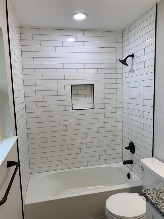 105 Still Street Kemp, TX 75143 - Photo 23 of 28 Bathroom with vanity, tub / shower combination, and recessed lighting