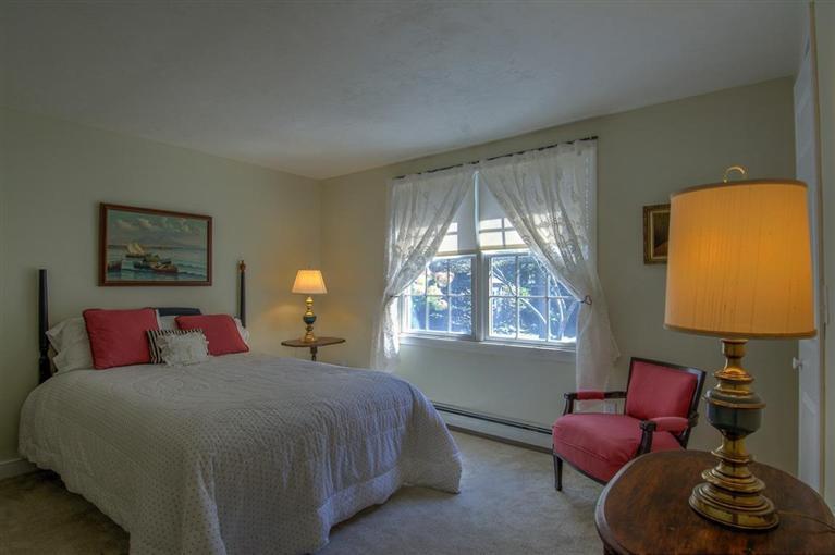 29 David Street Osterville, MA 02655 - Photo 18 of 26 a bedroom with a bed and a lamp