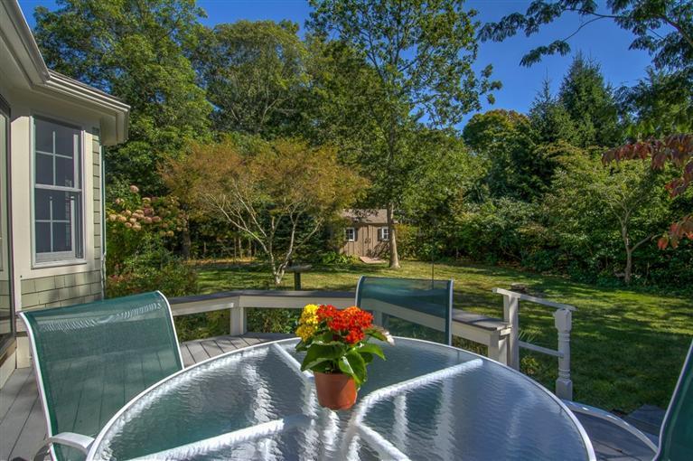29 David Street Osterville, MA 02655 - Photo 24 of 26 a view of a chairs and table in the patio