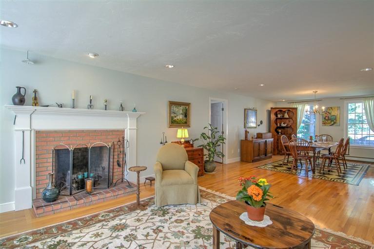 29 David Street Osterville, MA 02655 - Photo 3 of 26 a living room with furniture and a fireplace