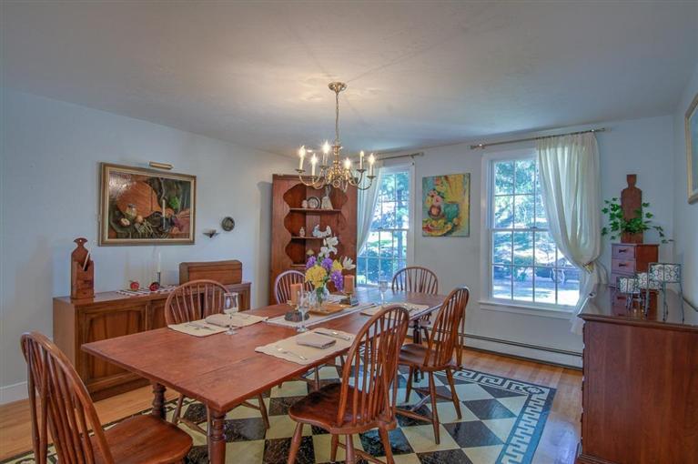 29 David Street Osterville, MA 02655 - Photo 5 of 26 a view of a dining room with furniture window and wooden floor