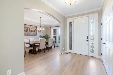 a living room with furniture and a table