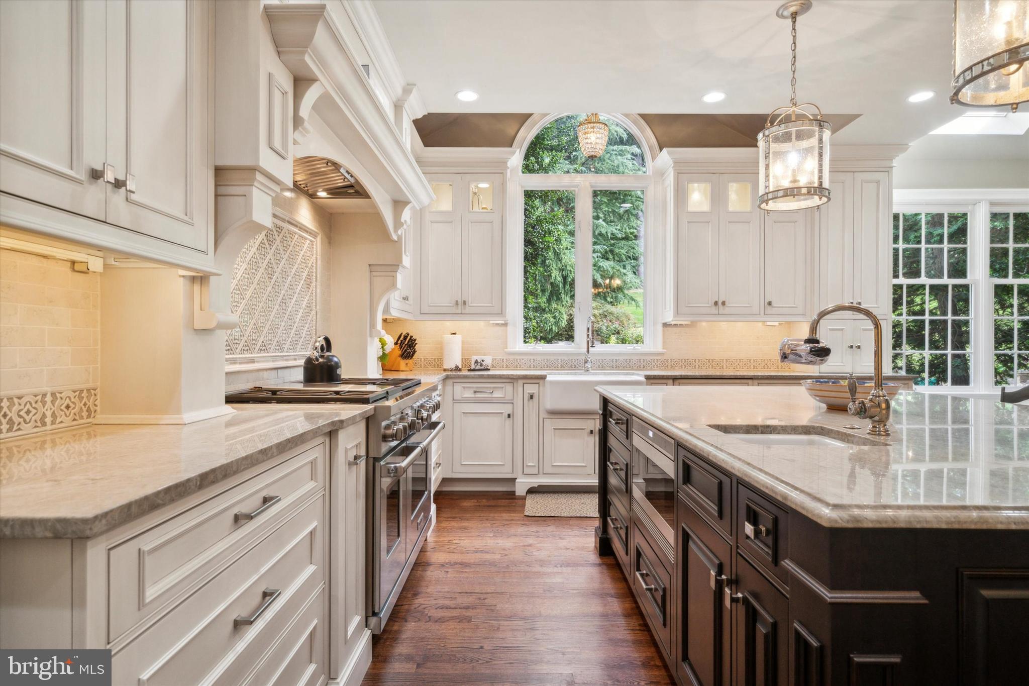 145 Biddulph Road Wayne, PA 19087 - Photo 12 of 38 a kitchen with a sink stove and cabinets