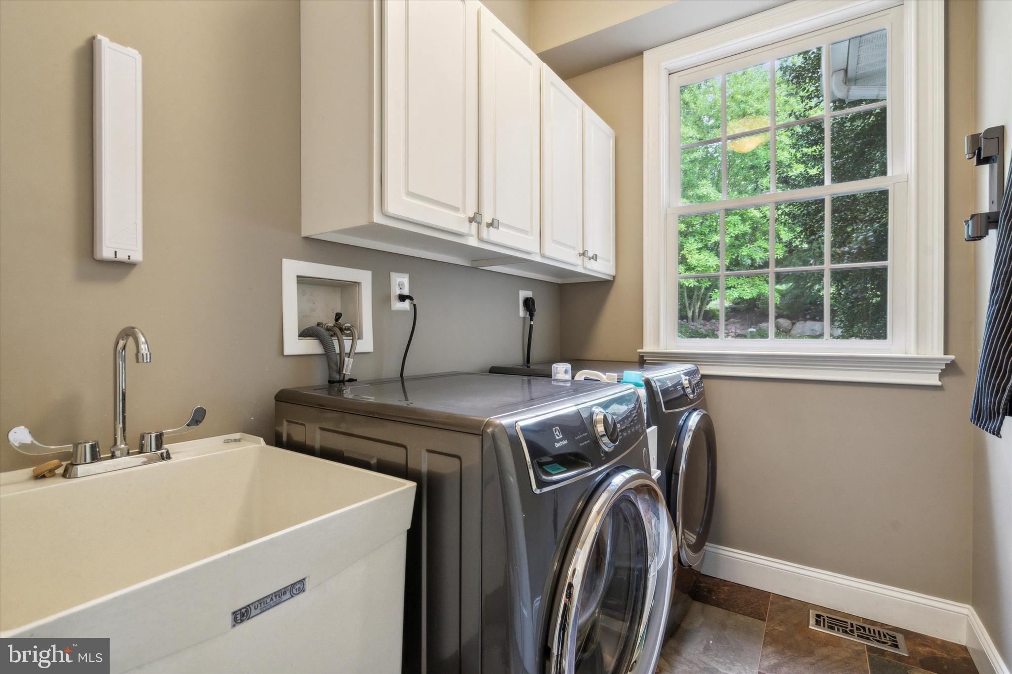145 Biddulph Road Wayne, PA 19087 - Photo 15 of 38 a utility room with dryer and washer