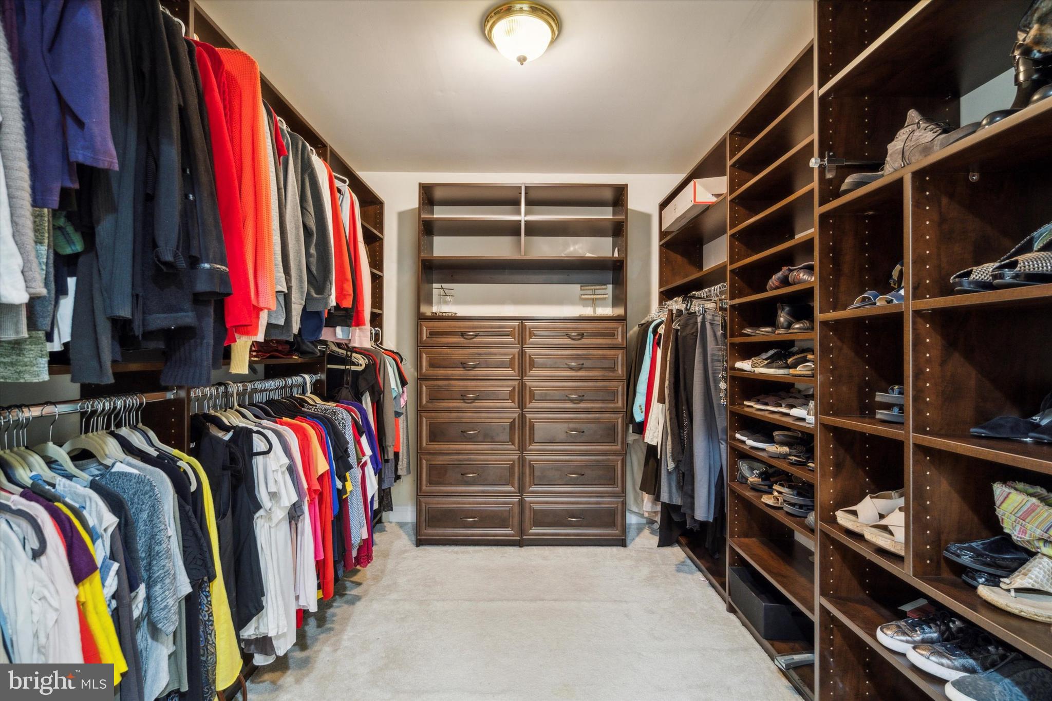 145 Biddulph Road Wayne, PA 19087 - Photo 23 of 38 a view of walk in closet with clothes and shoes