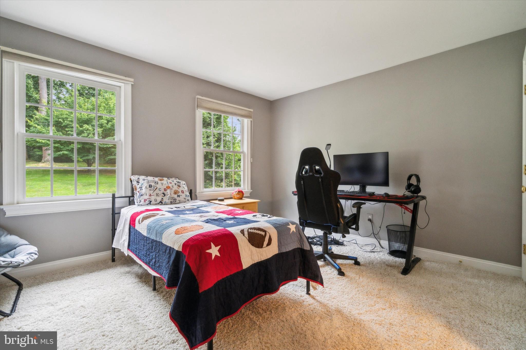 145 Biddulph Road Wayne, PA 19087 - Photo 27 of 38 a bedroom with bed and a window