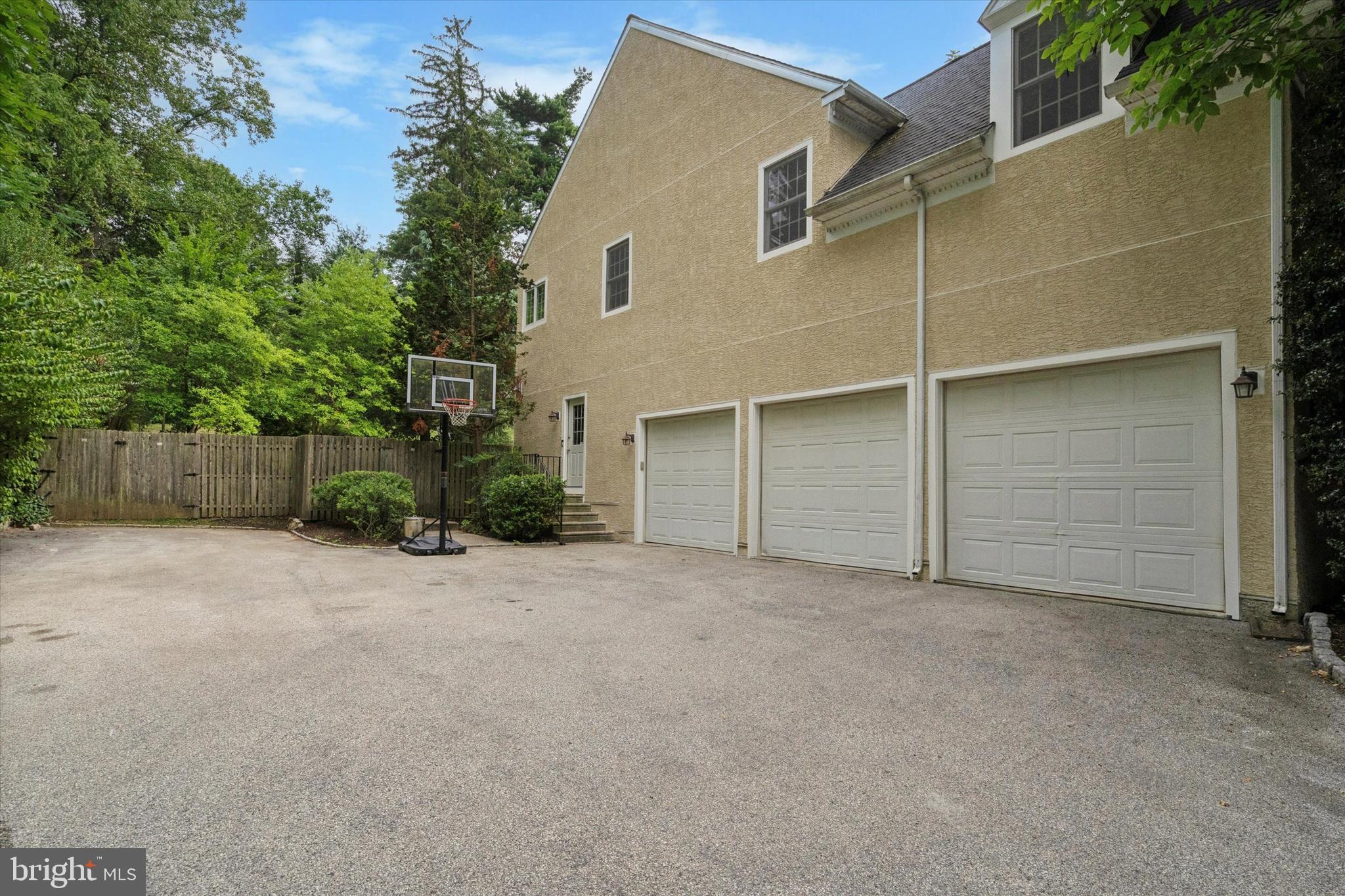 145 Biddulph Road Wayne, PA 19087 - Photo 38 of 38 front view of a house with a yard and garage