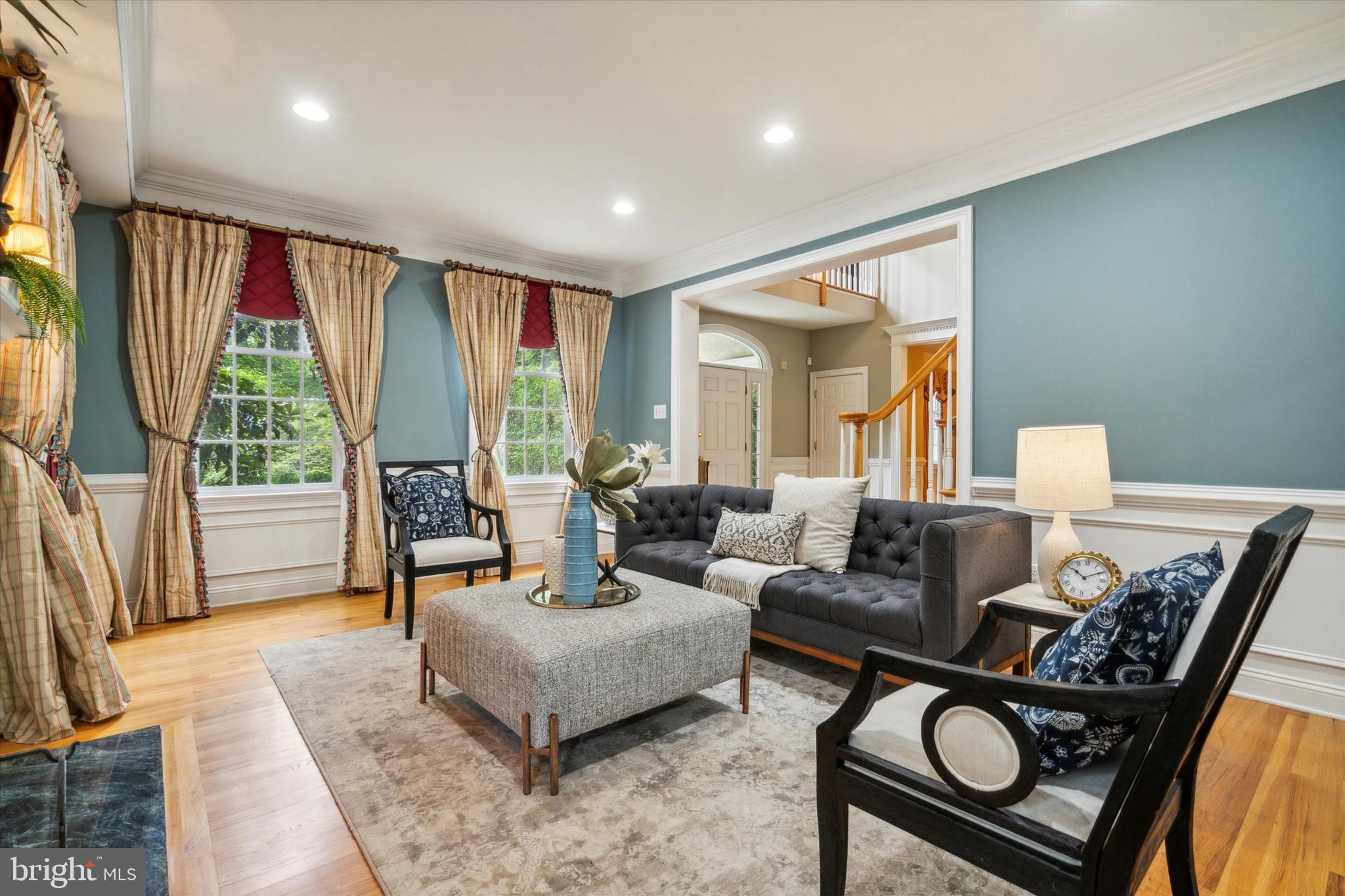 145 Biddulph Road Wayne, PA 19087 - Photo 5 of 38 a living room with furniture and a large window
