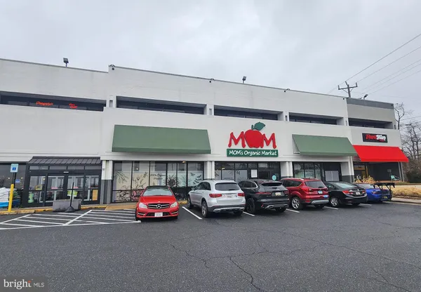 a car parked in front of a store