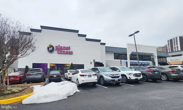 a group of cars parked in a parking lot