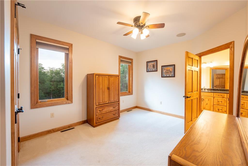 2780 Ipnar Road Irwin, PA 15642 - Photo 20 of 40 a view of a livingroom with wooden floor and a ceiling fan