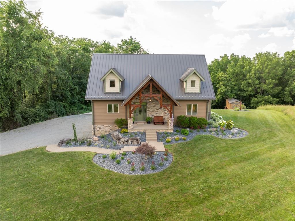 2780 Ipnar Road Irwin, PA 15642 - Photo 3 of 40 a front view of a house with garden