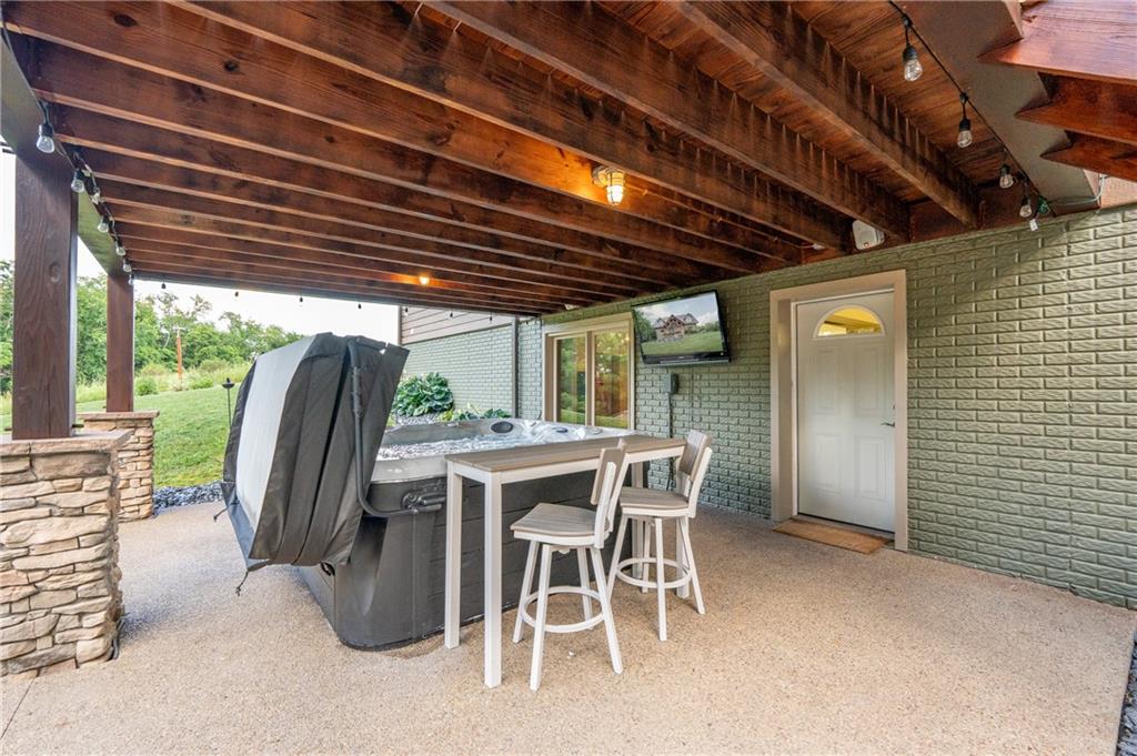2780 Ipnar Road Irwin, PA 15642 - Photo 31 of 40 a view of a backyard with furniture and a grill