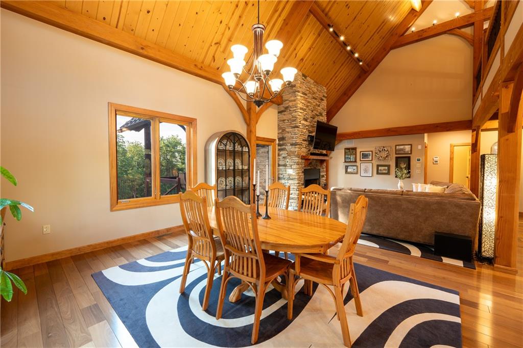 2780 Ipnar Road Irwin, PA 15642 - Photo 10 of 40 a dining room with furniture a floor to ceiling window and potted plants