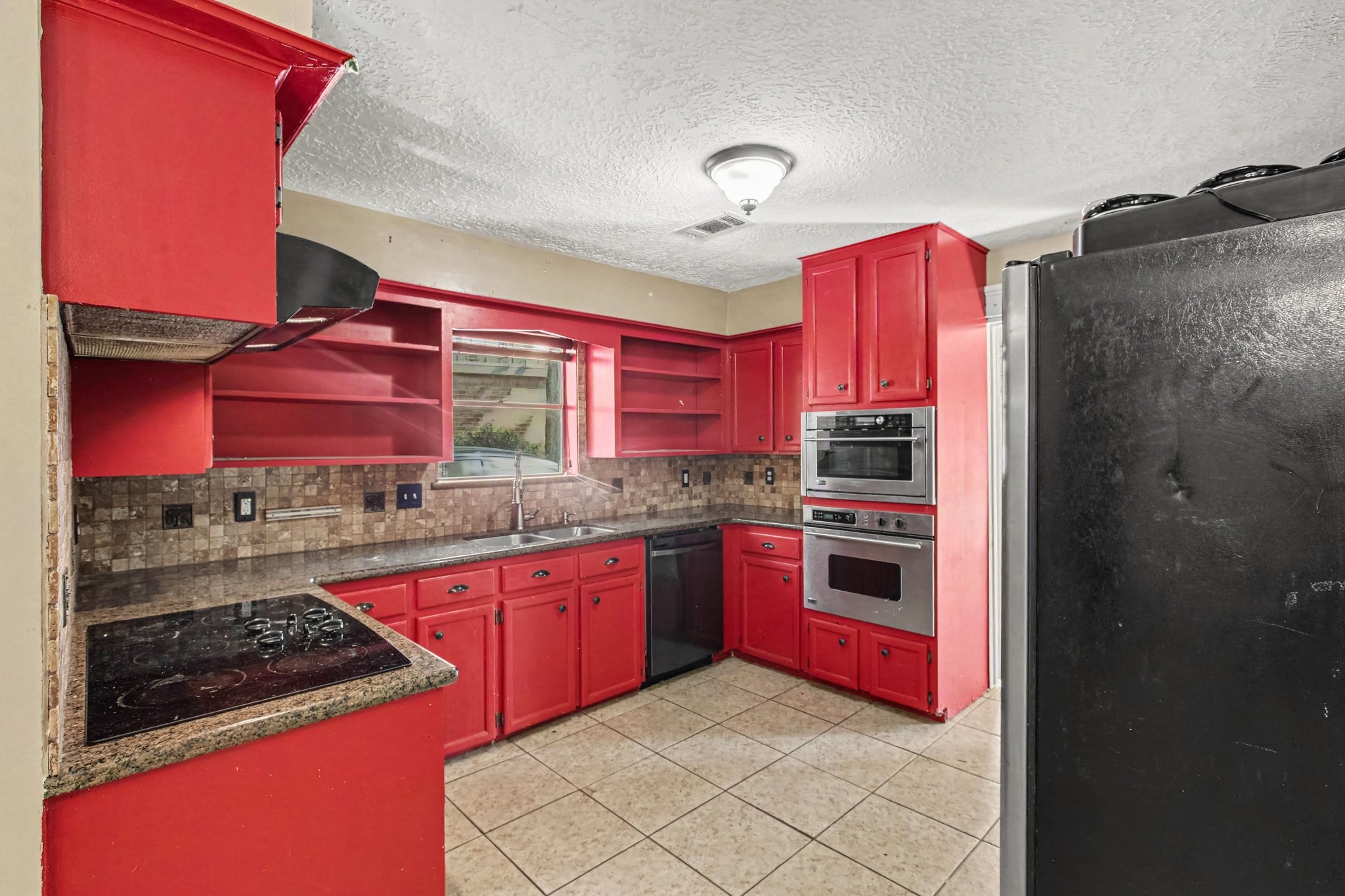 17807 Loring Lane Spring, TX 77388 - Photo 3 of 24 The kitchen offers plenty of space