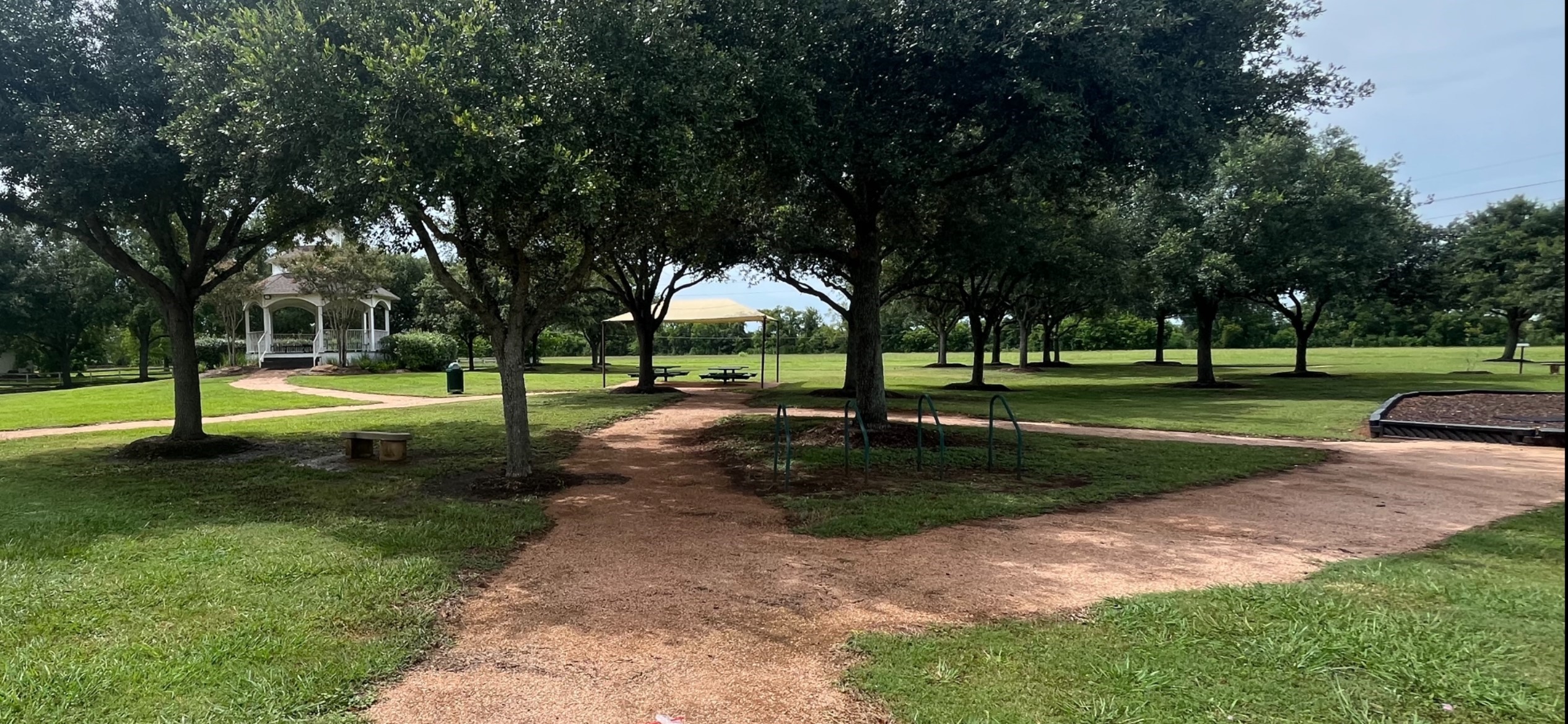 6703 Rustling Oaks Drive Rosenberg, TX 77469 - Photo 8 of 10 a view of a park with tree s