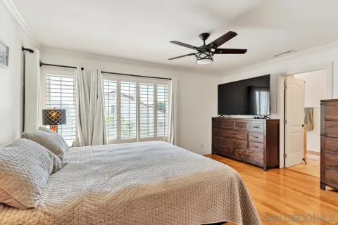 a bedroom with a bed and furniture