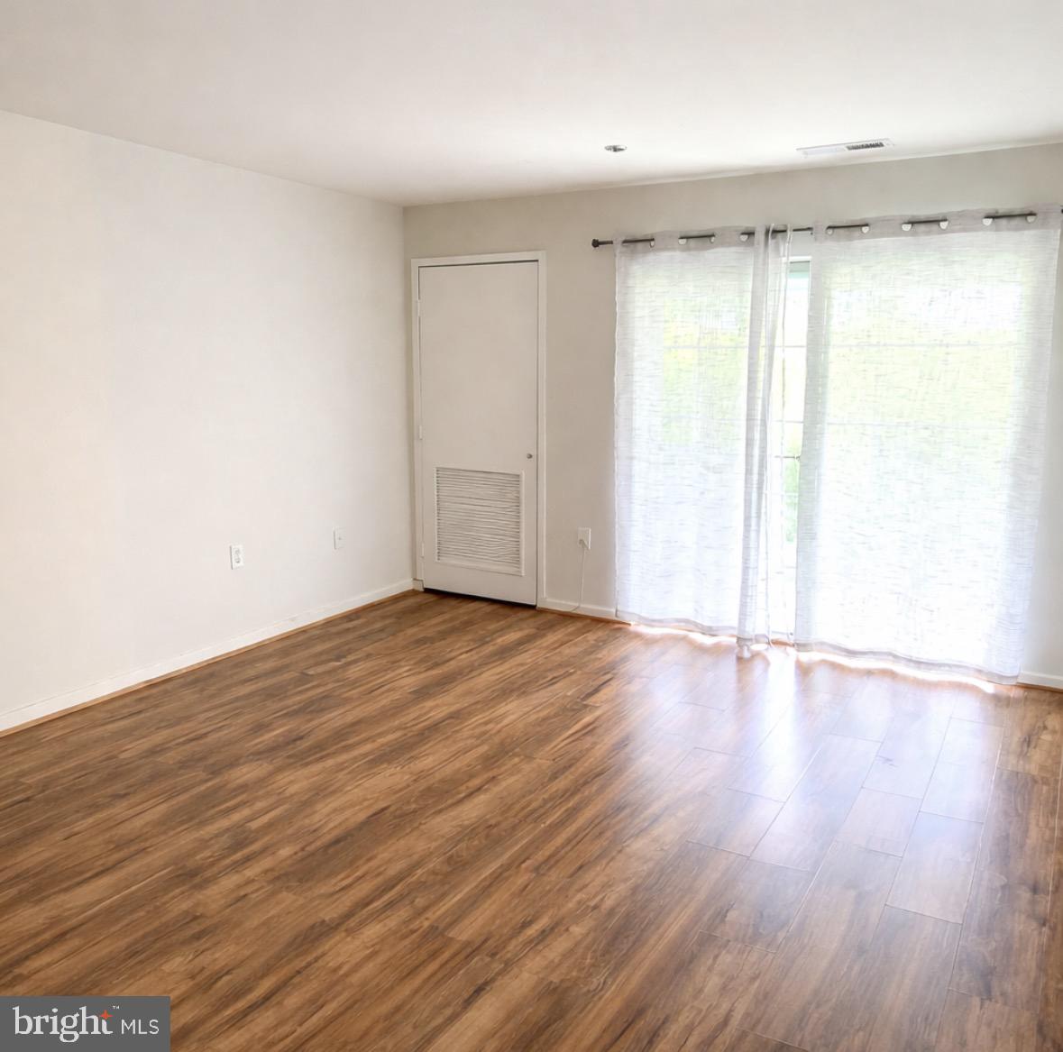8503 Falls Run Road, Unit B Ellicott City, MD 21043 - Photo 12 of 23 Bright and airy living space awaits.