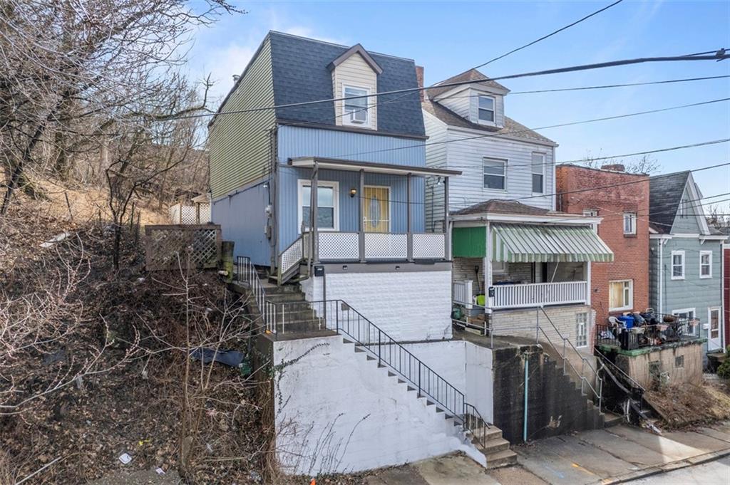 5270 Wickliff Street Pittsburgh, PA 15201 - Photo 33 of 33 a front view of a building with sitting area