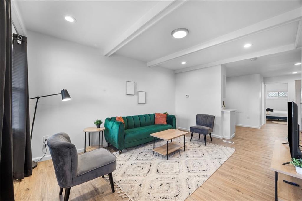 5270 Wickliff Street Pittsburgh, PA 15201 - Photo 5 of 33 a living room with furniture and wooden floor
