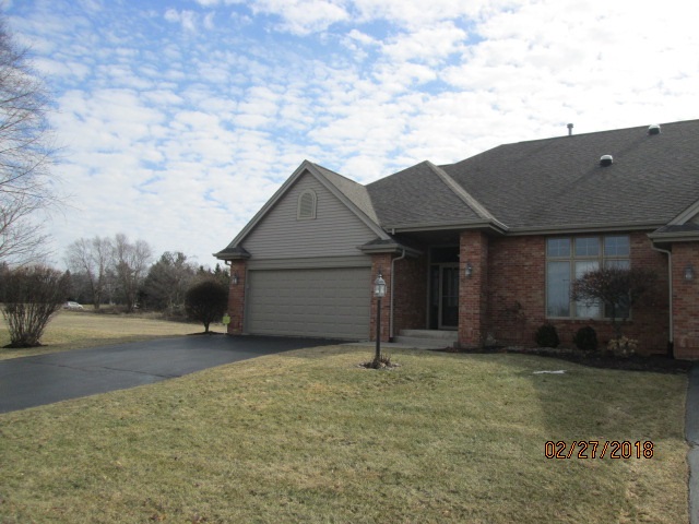 6911 Rote Road Rockford, IL 61107 - Photo 2 of 5 a backyard of a house with lots of green space