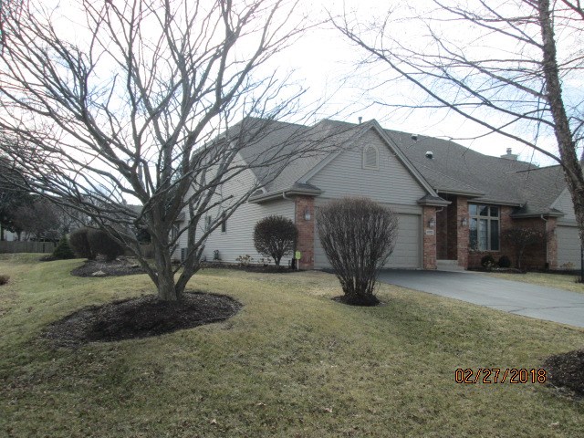 6911 Rote Road Rockford, IL 61107 - Photo 3 of 5 a view of a house with backyard and a tree