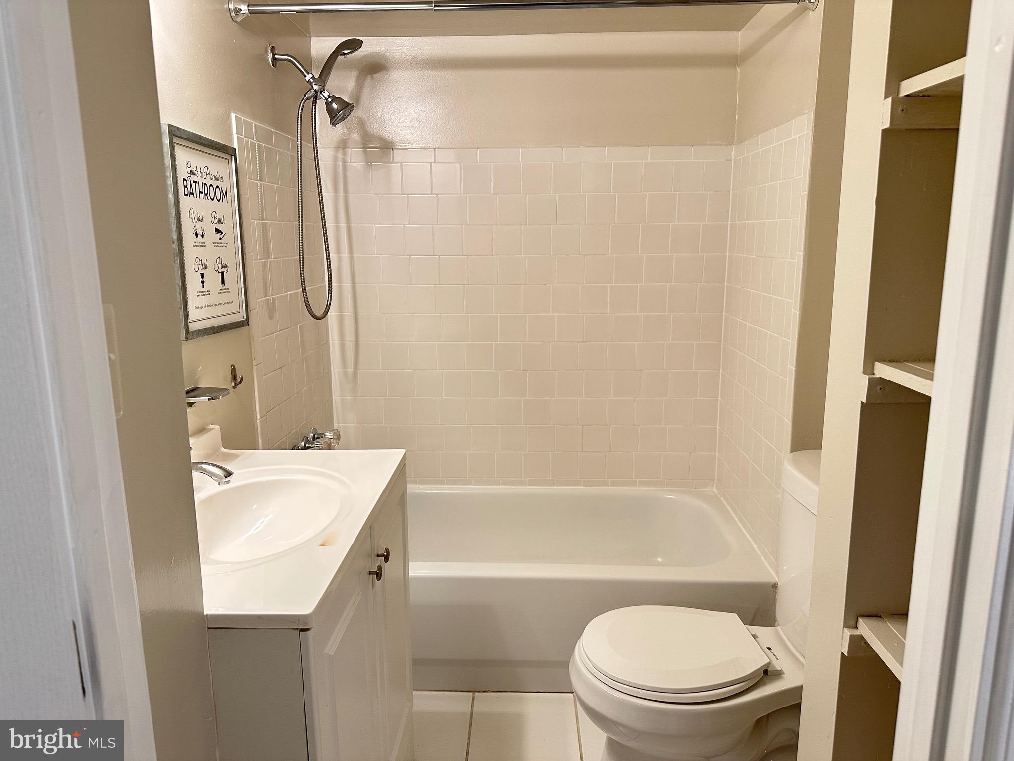 3626 12th Street Northeast Washington, DC 20017 - Photo 9 of 9 a bathroom with a sink toilet and shower
