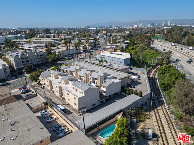 an aerial view of a house with a garden