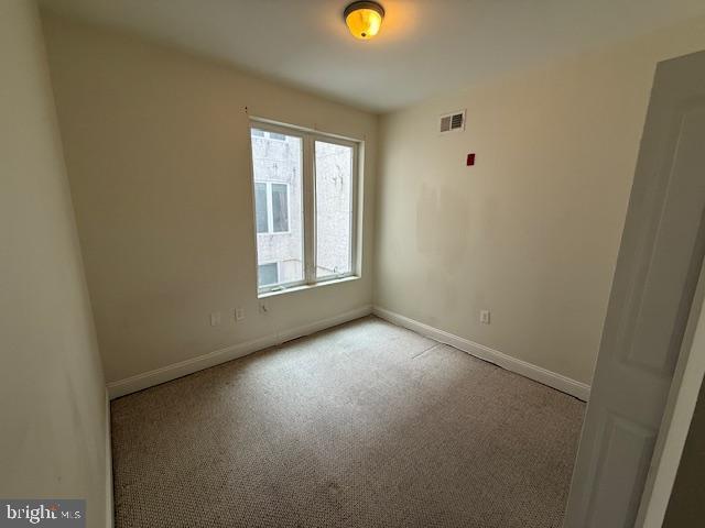 4128 Chester Avenue, Unit 1A Philadelphia, PA 19104 - Photo 5 of 11 an empty room with windows and window