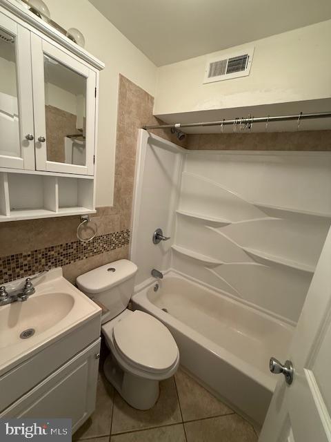 4128 Chester Avenue, Unit 1A Philadelphia, PA 19104 - Photo 9 of 11 a bathroom with a sink a toilet and shower