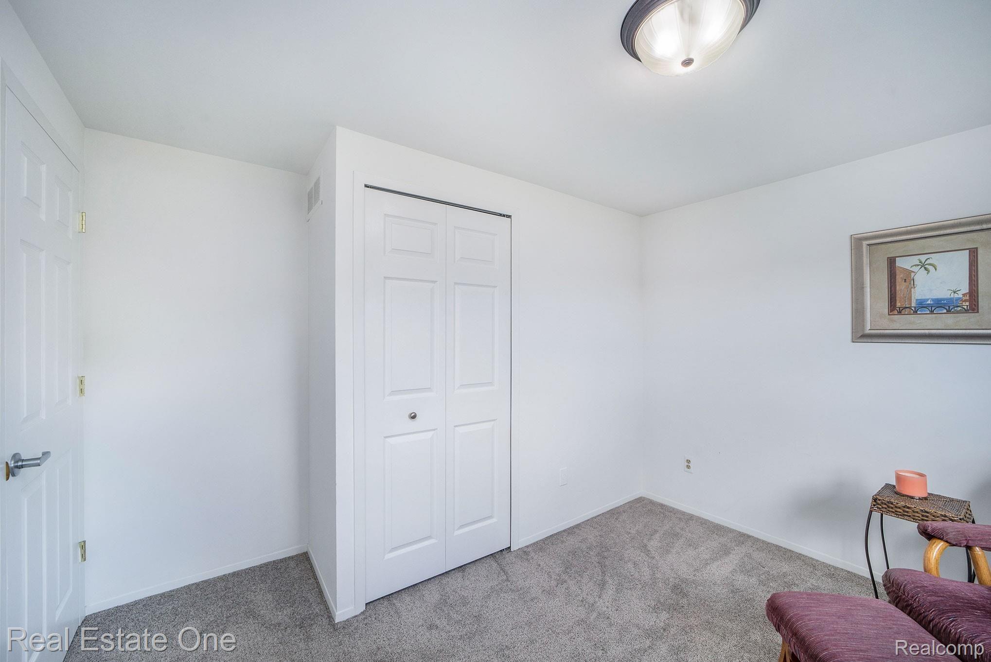 35750 Shell Drive Sterling Heights, MI 48310 - Photo 17 of 38 Same bedroom with view of the backyard.