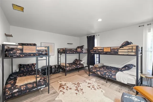 a room with a cabinets and wooden floor